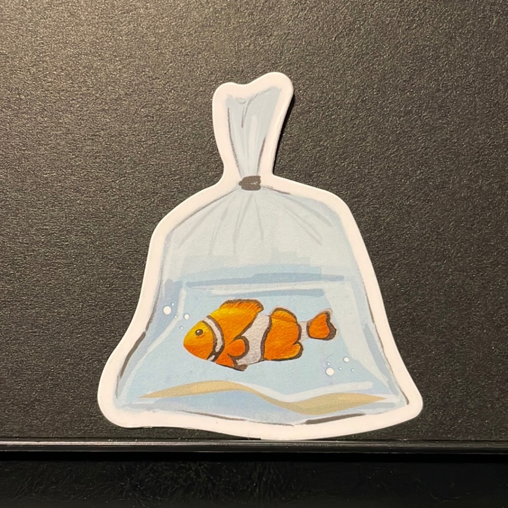 CLOWN FISH IN TAKE HOME BAG STICKER